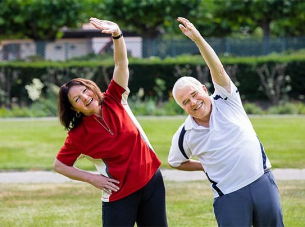 two people stretching for exercise